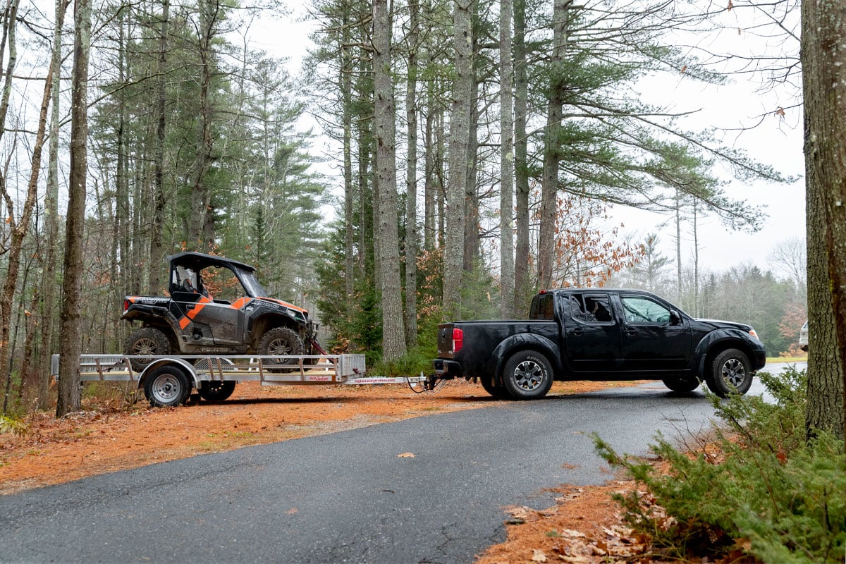 Black Truck Backing A 83 Inch Open ATV Trailer