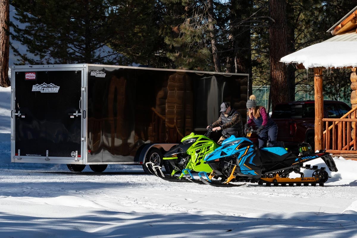 Enclosed Inline Black Snow Trailer With Snowmobiles