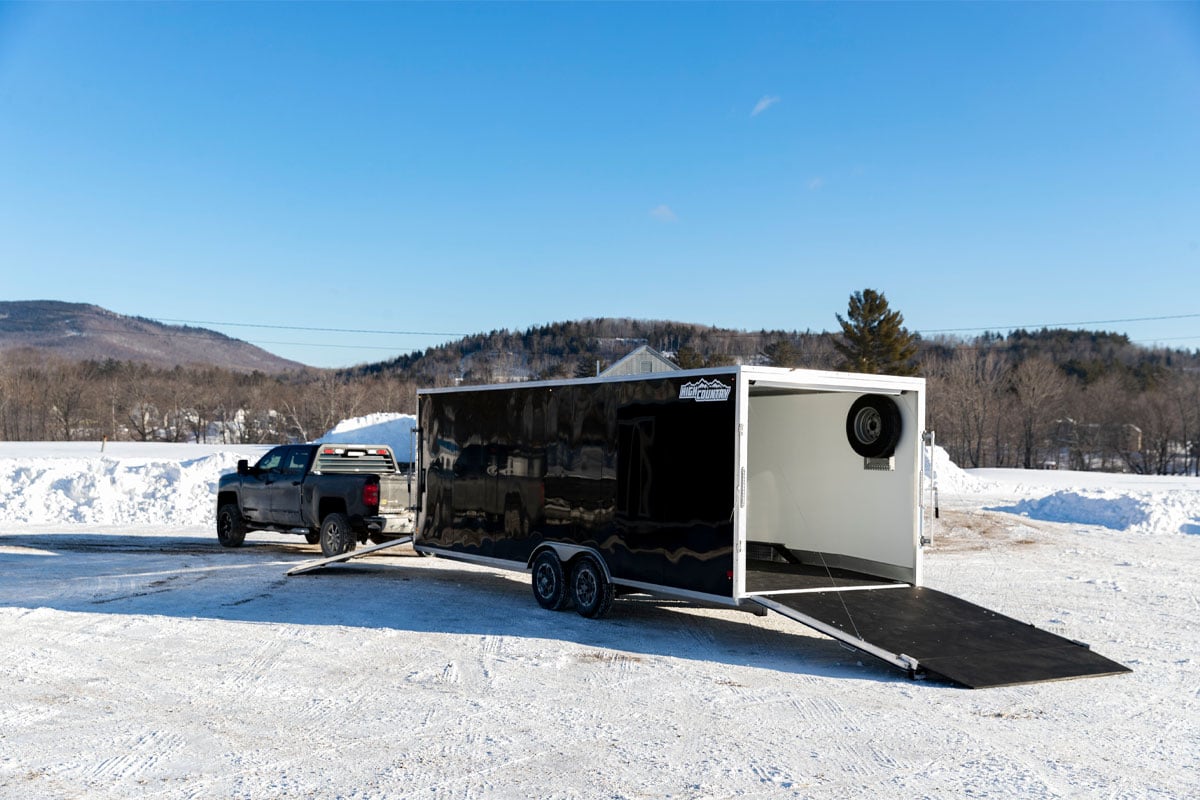 Parked Black High Country All Sport Snow Trailer With Truck