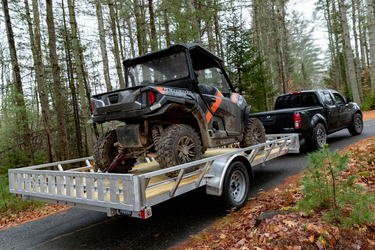 Rear View Of ATV On 83 Inch Open ATV Trailer On Paved Road